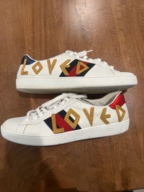 Gucci White Leather Low-Top Sneakers with Gold 'LOVED' Patch and Red & Navy Web